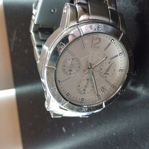 JENNIFER LOPEZ WATCH; Silver tone; 7-1/2" adjusted watchband; NEW WATCHBAND INCL